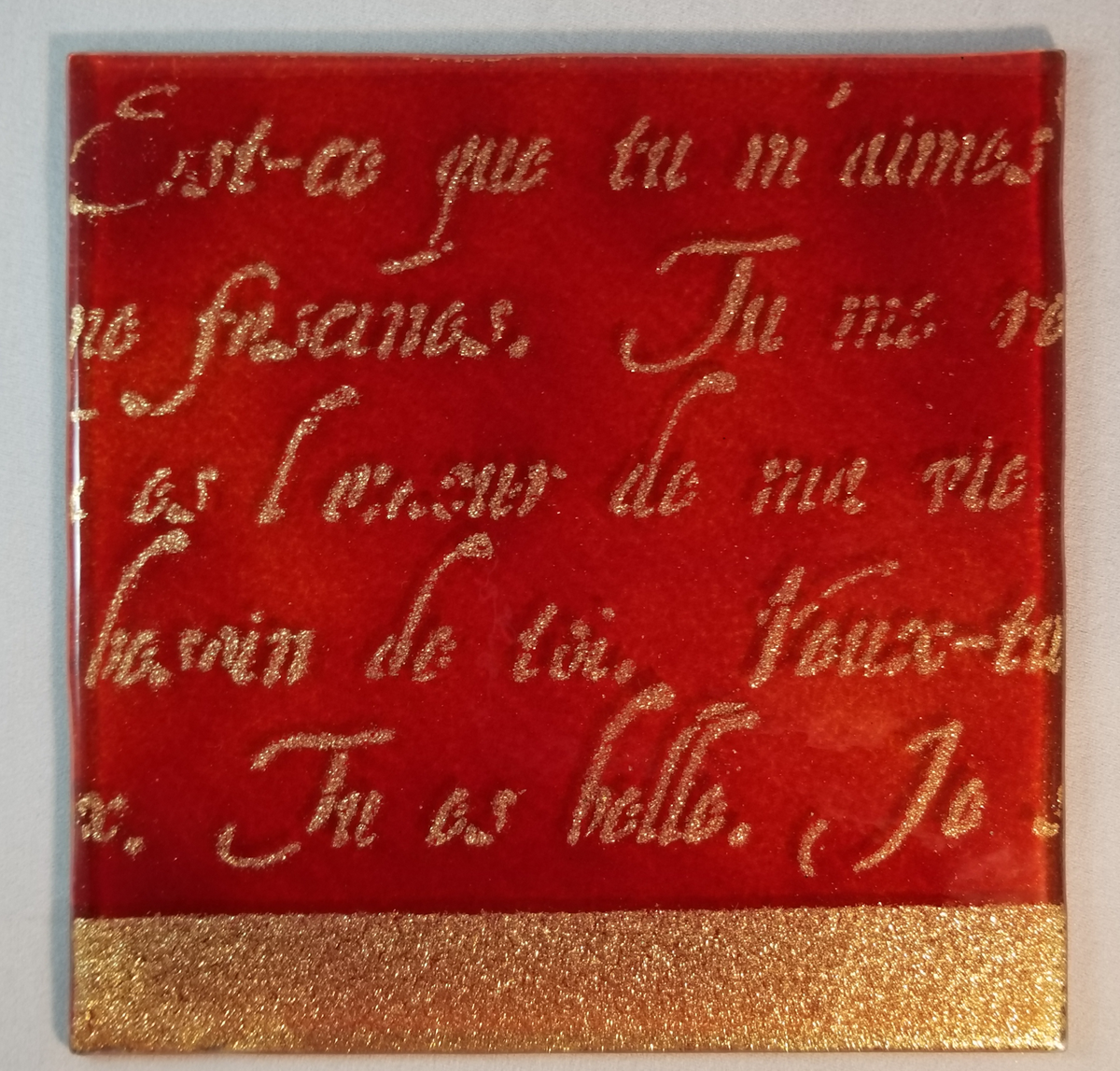 Gold and Red Persian Writing